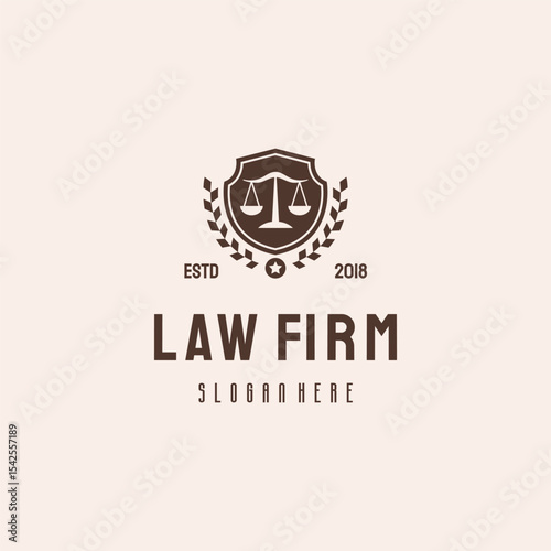 Law firm  with scales of justice emblem.