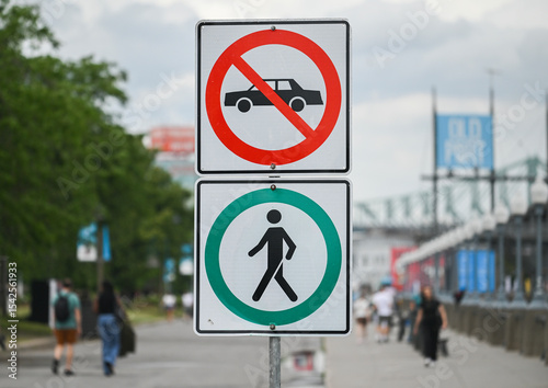 signage indicating no cars and pedestrian zone