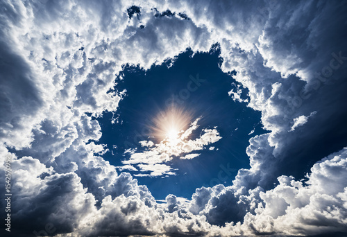 sun shining through circular cloud opening