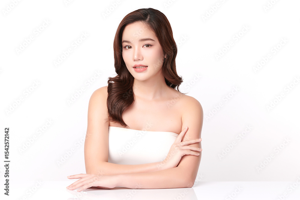 A beautiful young Asian woman with clean, fresh skin against a white background. Skincare, facial treatment, cosmetology, beauty, and spa. An elegant portrait of an Asian woman. A beautiful young Asian woman with clean, fresh skin against a white background. Skincare, facial treatment, cosmetology, beauty, and spa. An elegant portrait of an Asian woman.