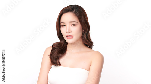 A beautiful young Asian woman with clean, fresh skin against a white background. Skincare, facial treatment, cosmetology, beauty, and spa. An elegant portrait of an Asian woman.