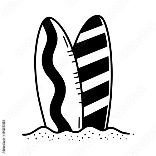 Two stylized black and white surfboards in sand with striped and wavy patterns
