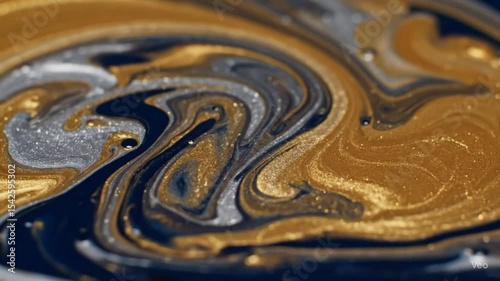 Abstract Slow Motion of Swirling Metallic Liquids