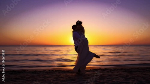 Couple at Beach sunset Groom lifting the bride joyfully on a beach during sunset, ocean in background, slow motion, romantic and cinematic vibe, soft wind in bride’s dress