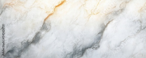 Close-up view of white and light gray marble texture with natural veins and subtle orange highlights creating an elegant and smooth surface