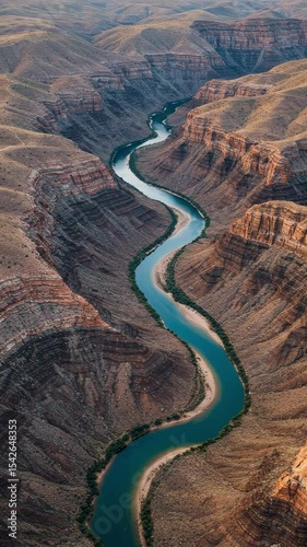Stunning Aerial View of Winding River Through Grand Canyon Landscape