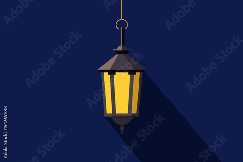 Illuminated hanging lantern on dark blue background