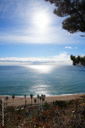 beautiful seascape with seaside walkway and sparkling sea