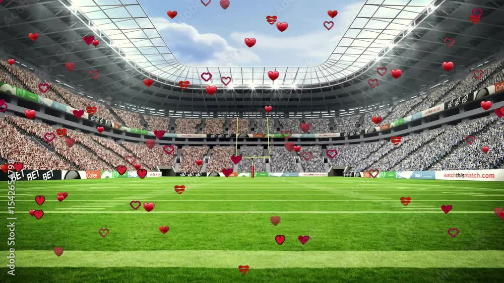 After pause red 3D hearts floating diagonally across stadium forming shower showing fan support