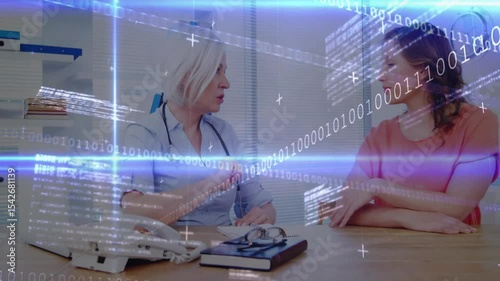 Binary overlay drifting as doctor explaining medical data via handheld device while patient nodding