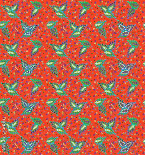 Folklore ornament with green coleus leaves and small flowers and branches with berries on an orange background. Boho print for fabric. Beautiful pattern for a dress, scarf, tablecloth.