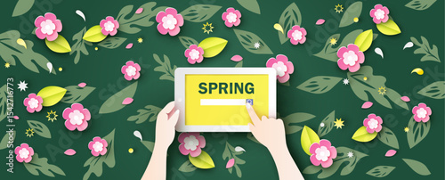 Women are internet searching for about Spring on tablet in hand decorated with flower placed on the desk. Spring time. paper cut and craft style. vector, illustration.