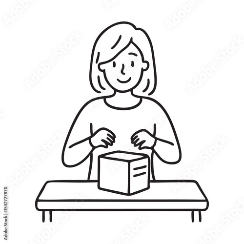 A person unboxing a package on a small wooden table