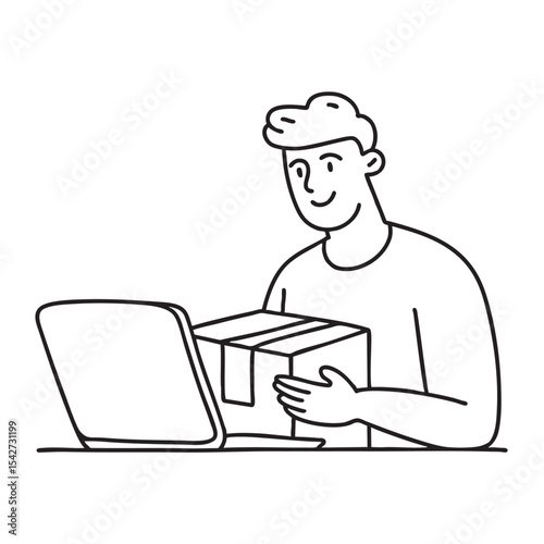 A man opening a parcel beside his laptop