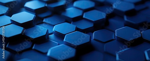 Close-up view of a repeating pattern of deep blue hexagonal shapes.  The shapes are 3D,  interlocking, and have a slightly reflective surface