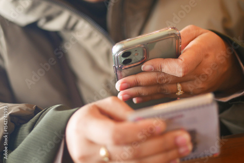 person scan QR code with smart phone at cafe 