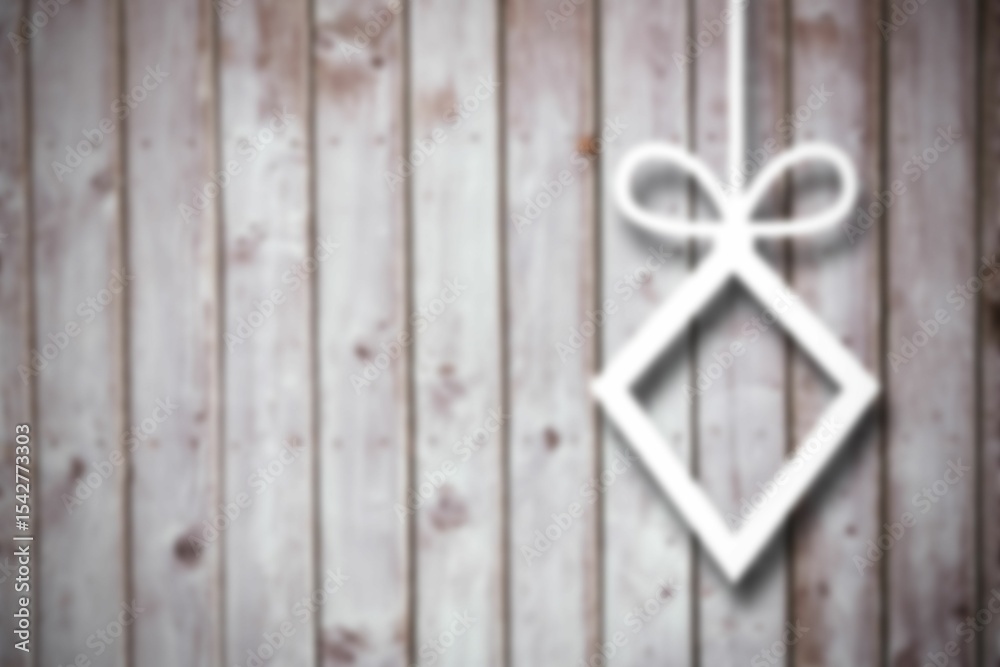 Obraz premium Blurred christmas decorations on wood