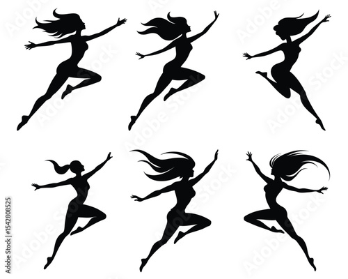 Silhouettes of women dancing in energetic jumping motion