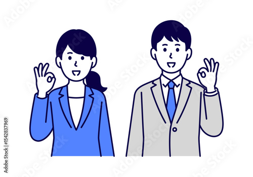 OKサインをするスーツ姿の男女