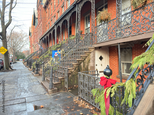 A garden apartment with a staircase at the entrance, typical of those seen in New York.
A house in which the basement is used as a cellar or rented out.
