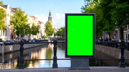 Blank green screen billboard in canal city