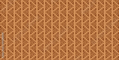 Geometric terracotta pattern with repeating triangle and arrow motifs.