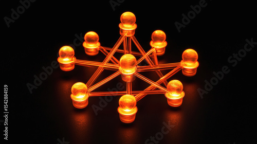 A glowing orange network of interconnected nodes forming a geometric molecular or technological structure on a dark background.