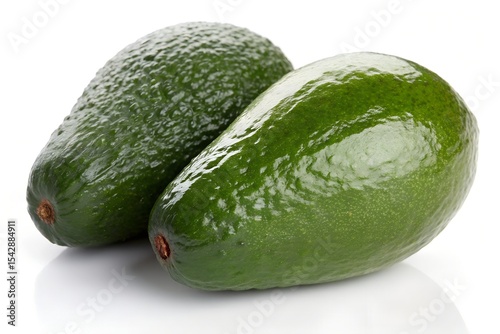 A pair of avocados on a white background.