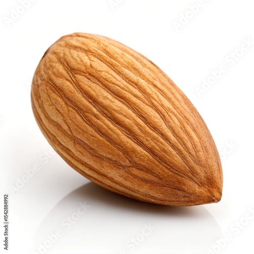 A single almond nut on a white background, highlighting its natural texture.
