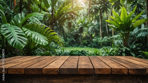 Wooden table top in a tropical garden setting.