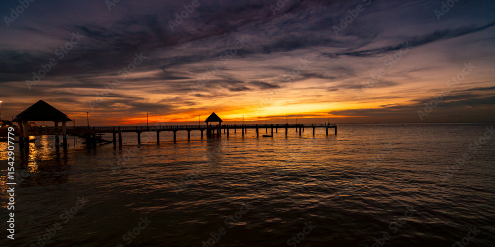 Fototapeta premium Sunsets, Jetties Piers and Beaches in Thailand