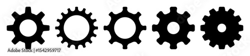 Set of mechanical gear wheels in black silhouette isolated on white background