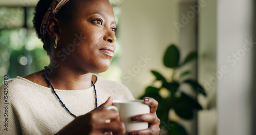 Obraz na plátne Thinking, tea and black woman in home for relax, peace or calm with serious mindset on weekend