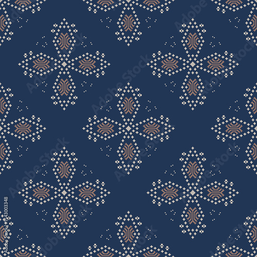 Ikat seamless pattern. Border with snowflakes. Openwork lace. New Year's Christmas background. Vector tie-dye shibori print with stripes and chevron. Bohemian fashion.