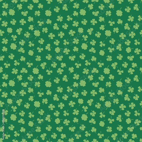 Shamrock or clover leaf flat design green seamless pattern falling leaves on white background vector illustration. Irish holiday celtic St Patrick day motif seamless pattern with shamrock clover leaf.