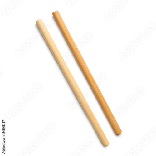 Two bamboo sticks, one light and one dark, are placed parallel on a clean white background, showcasing their natural textures and colors for design and crafting purposes