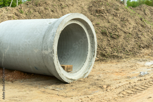 Wallpaper Mural Modern concrete pipes in urban infrastructure: sustainable solutions for drainage system installation and sewage systems. Efficient solutions for sewage and infrastructure development. Torontodigital.ca