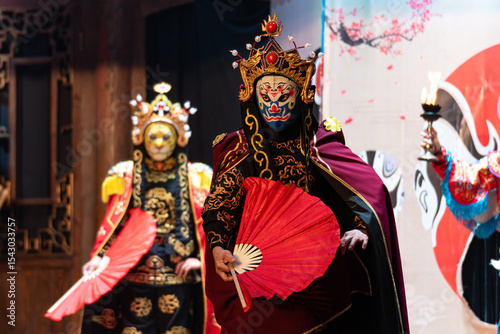 Sticker Chinese actor performs a public traditional changing face performance onstage in