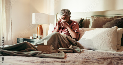 Konstfotografi Senior, sick woman and blowing nose with tissue on bed for influenza or viral infection at home