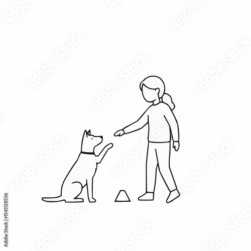 Young girl training her dog to perform a trick on white background  