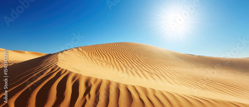 Natural environment close-up photography of sunbleached desert sand dunes