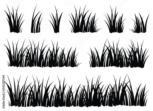 A collection of grass silhouetted against a white background offers a stark, minimalist scene. The blades create a dynamic yet simple visual, adding an organic element.