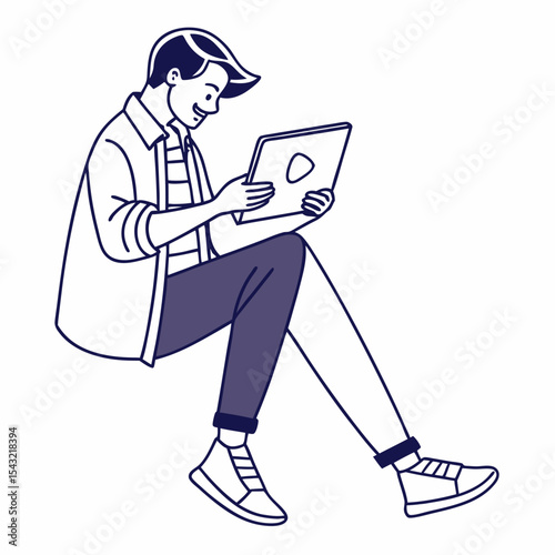 Young man sitting comfortably watching video on tablet