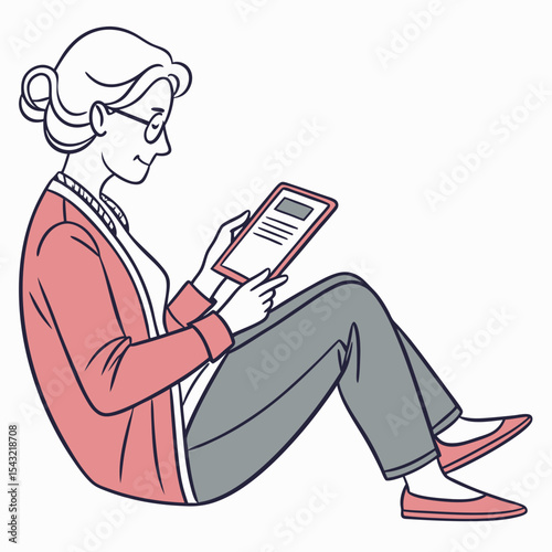Senior woman using tablet sitting comfortably floor