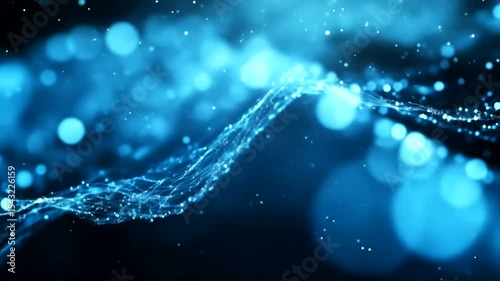 Abstract blue wave pattern with glowing particles in a dark environment, perfect for digital backgrounds