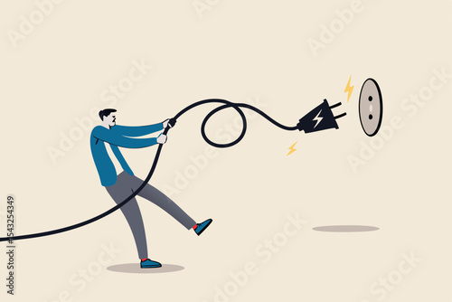 Electricity saving, ecology awareness or reduce electric cost and expense concept, man pulling electric cord to unplug to save money or for ecology power.