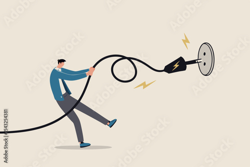 Electricity saving, ecology awareness or reduce electric cost and expense concept, man pulling electric cord to unplug to save money or for ecology power.