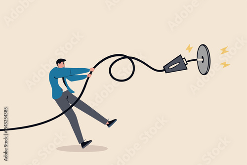 Electricity saving, ecology awareness or reduce electric cost and expense concept, man pulling electric cord to unplug to save money or for ecology power.
