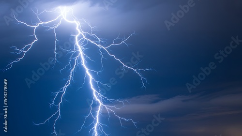 A Dramatic Photograph of a Massive Lightning Bolt Striking the Night Sky