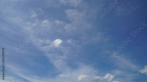 clouds and blue sunny sky,  white clouds over blue sky, Aerial view,  nature, blue sky, white clear weather. Time lapse video 4 K.